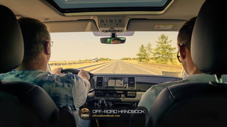 View from the back seat of a car with an open sunroof on a highway — Off-Road Handbook