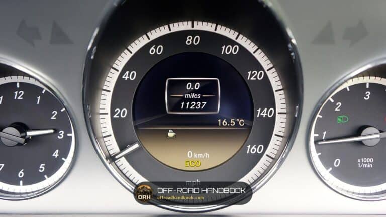 Car instrument cluster with a speedometer in mph and a message display, a generic cluster and not a Jeep