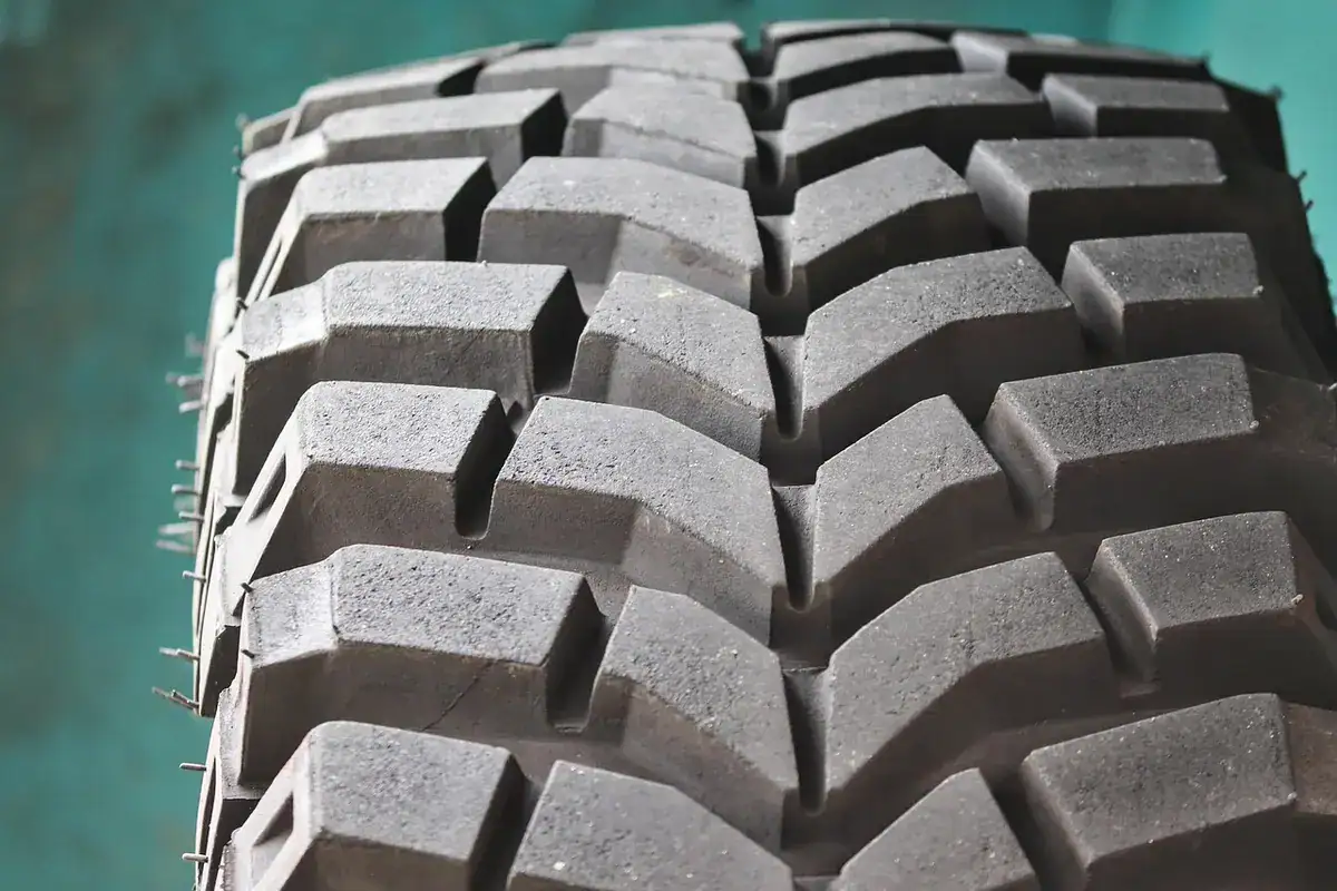 Close-up of the large tread blocks on an off-road tire