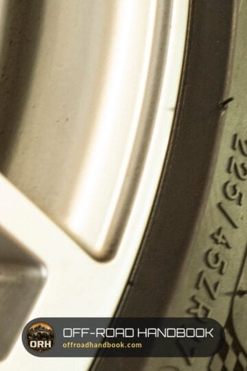 Close-up of a tire sidewall showing the molded size marking 225/45 ZR 17 — Off-Road Handbook