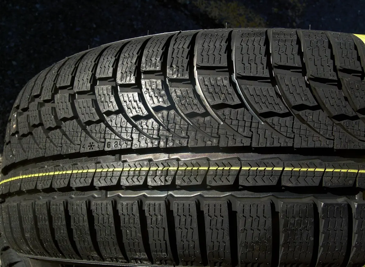 Close-up of the tread blocks on a new car tire